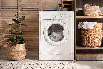 Wall Mural - Modern washing machine and shelving unit in laundry room interior