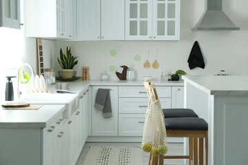 Sticker - Modern kitchen interior with stylish white furniture