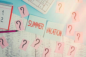 Word writing text Summer Vacation. Business photo showcasing several short trips which take place on the hottest season Writing tools, computer stuff and math book sheet on top of wooden table