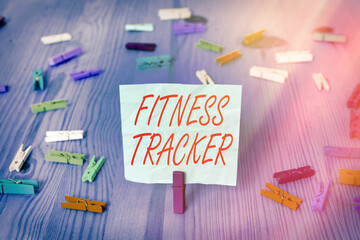 Poster - Writing note showing Fitness Tracker. Business concept for a monitoring device that records any healthrelated activity