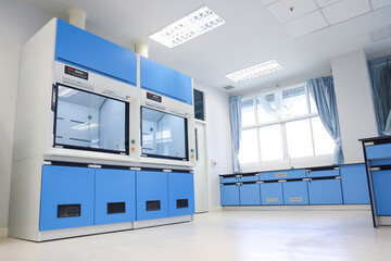 Laboratory fume hoods in science classroom interior of university college for protect the user from inhaling toxic gases (fume hoods, biosafety cabinets, glove boxes).