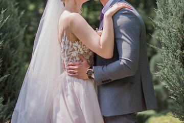 bride and groom in the park together