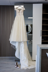 Poster - bride wedding dress hanging on the closet