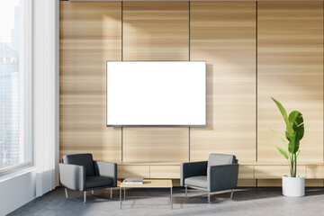 Wall Mural - Wooden office waiting room with armchairs and TV