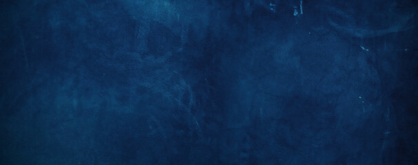 Wall Mural - The background of the stucco wall is dark blue. wall texture rough abstract decorated in blue.