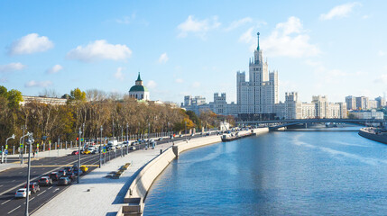 October 22, 2017 Moscow, Russia. Cars on Moskvoretskaya embankment and a view of the high-rise on Kotelnicheskaya embankment in Moscow.