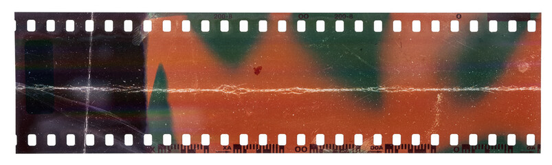 start of 35mm negative filmstrip, first frame on white background, real scan of film material with c