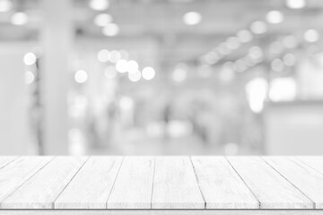 Wall Mural - Empty white table top, counter over blur white bokeh light background. wooden shelf for product display, banner or mockup.