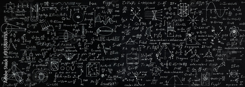 Wide blackboard inscribed with scientific formulas and calculations in physics, mathematics and electrical circuits. Science and education background.