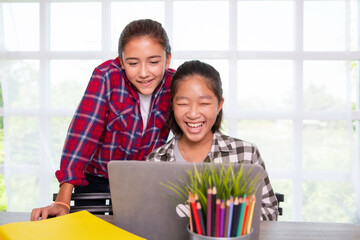 Teenager students girls enjoy watching and studying with computer pc