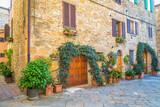 Fototapeta Na drzwi - Street with an old house in Pienza, a town in the province of Siena, in the Val d'Orcia in Tuscany, Italy, Europe.