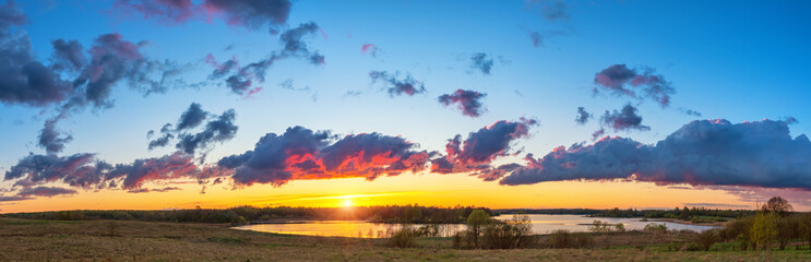 Wall Mural - Beautiful landscape with colorful sunset over forest lake