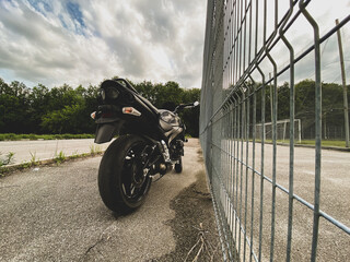 Wall Mural - Road black motorcycle on the road.