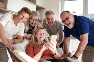 close up. group of happy senior friends .