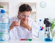 © Elnur - Lab assistant testing water quality