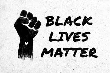 Stock illustration of a raised black fist and the phrase Black Lives Matter on a white textured background