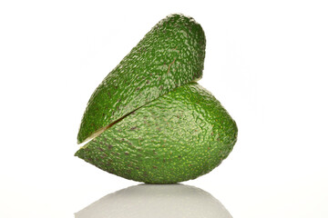 Juicy, ripe, organic avocados, close-up, on a white background.