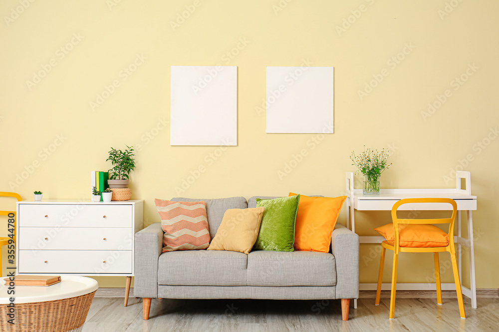 Interior of modern living room with comfortable sofa