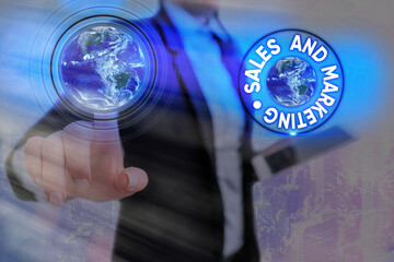 Poster - Writing note showing Sales And Marketing. Business concept for Business Advertising, Promotion, and Commercial Strategy Elements of this image furnished by NASA