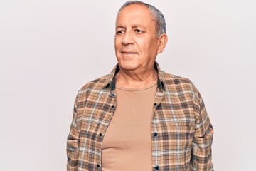 Sticker - Senior man with grey hair wearing casual shirt looking to side, relax profile pose with natural face and confident smile.