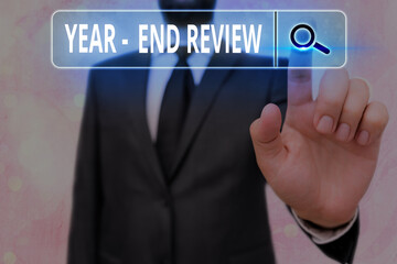 Poster - Writing note showing Year end Review. Business concept for annual assessment of achievement and goal development