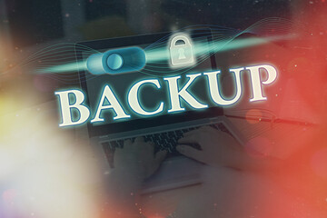 Writing note showing Backup. Business concept for process that protects important information from being lost