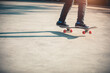 © lzf - Skateboarder skateboarding at morning outdoors