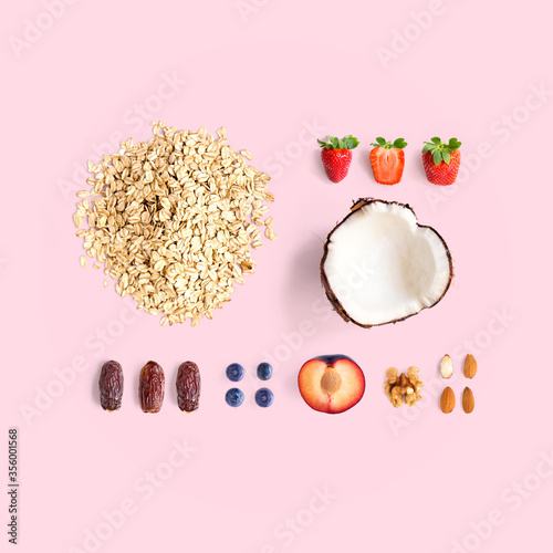 Cuadros en Lienzo Creative layout made of oatmeal, coconut, strawberry, plum, dried dates, blueberry, almond and walnut