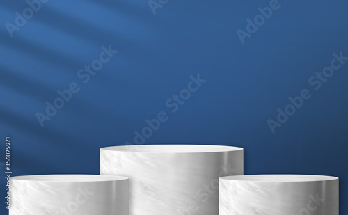 Fotografía Glossy marble cylinder stand product display two step with blue color background