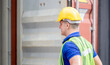 © JU.STOCKER - Engineer worker man in hardhat and safety vest checking containers box from cargo