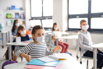 Poster - Children with face mask back at school after covid-19 quarantine and lockdown.