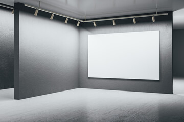 Modern gallery interior with blank poster on gray wall