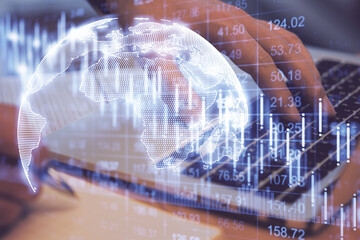 Poster - Hand using laptop with abstract falling stock exchange statistics hologram