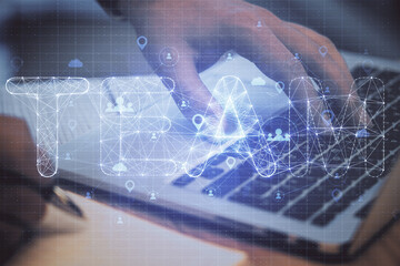 Aufkleber - Hand using laptop with glowing polygonal team hologram