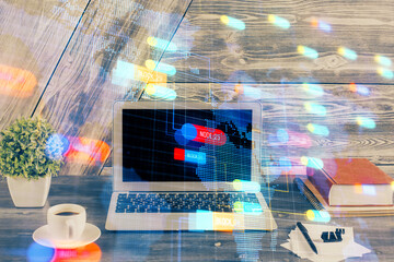 double exposure of desktop computer and technology theme hologram. concept of software development.