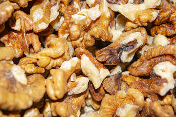 Peeled walnuts close-up. Surface texture. Healthy diet.