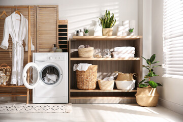 Poster - modern washing machine and shelving unit in laundry room interior