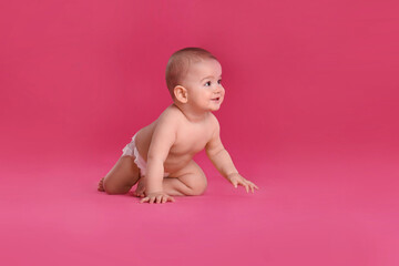 Poster - Cute little baby in diaper on pink background