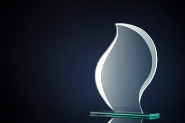 Wall Mural - stylish flame shaped glass trophy with copyspace