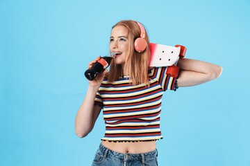 Poster - Image of girl in headphones posing with skateboard and drinking soda