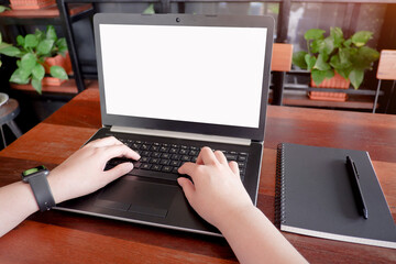 Fototapete - Cropped shot view of business woman’s hands typing the labtop with blank copy space screen for your information content or text message.