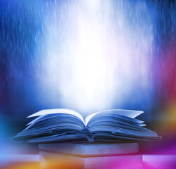 Poster - The blurred book that is bewitched with magic, the magic light in the dark, with the bright light shining down as the power to search for knowledge. For research and use as a blurred background