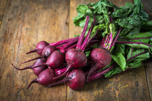 Fresh Red Organic Beets On A Wooden Table