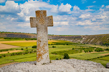 Old Christian Cross Above The Historical Temple Complex Of Old Orhei Or Orheiul Vechi, Moldova. July2019.