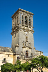 Bell tower of Santa Maria de la Asuncion church in Arcos de la Frontera, Spain