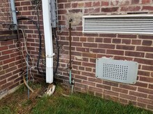 Broken Gutter Downspout With Wires