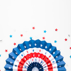 4th of July American Independence Day. Happy Independence Day. Red, blue and white star confetti, paper decorations on white background. Flat lay, top view, copy space, square