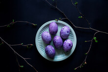 Purple Eggs On A Black Background