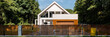 © Dariusz Jarzabek - Modern house with fence, panorama