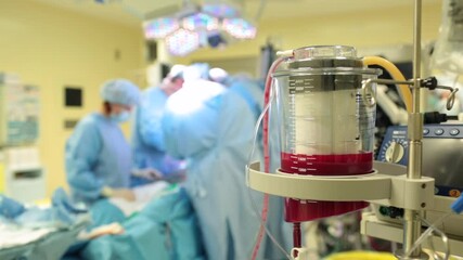 Wall Mural - Surgeons in the operating room with a patient